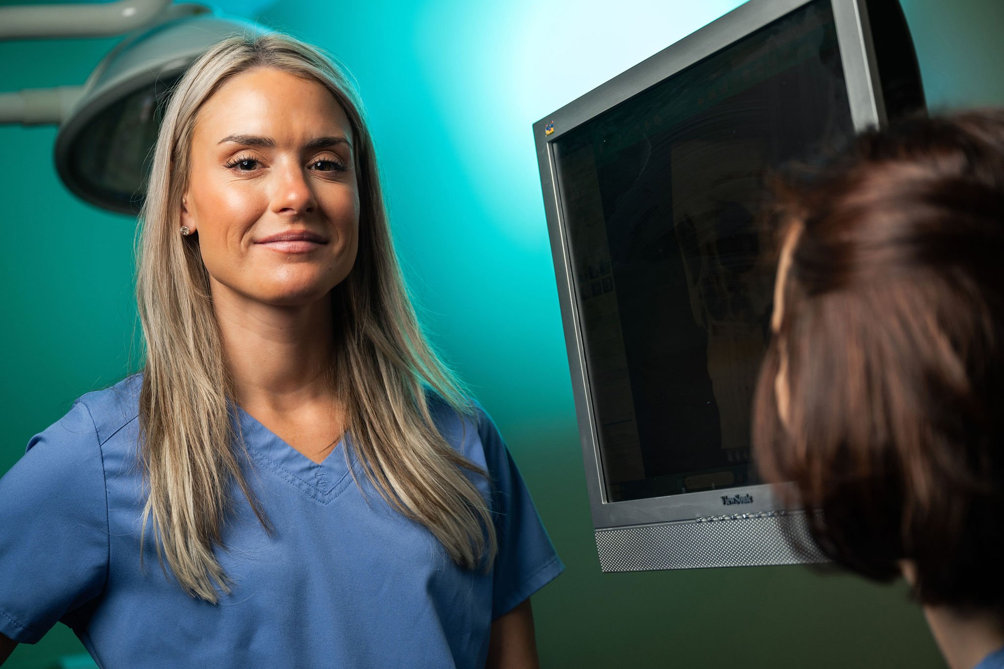 Dr. Haigney explaining facial plastic surgery process | Lake Norman Oral & Facial Surgery, Huntersville, NC